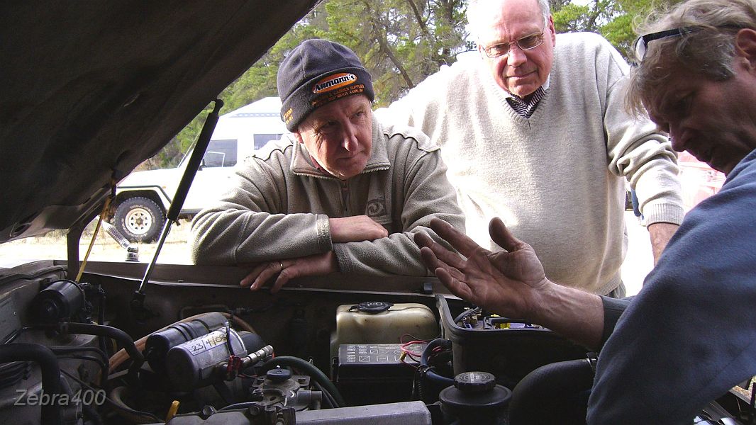 28-RACV mechanic tells Paul his timing belt has a snapped bolt.JPG